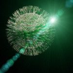 A dandelion with green and white seeds in the air.